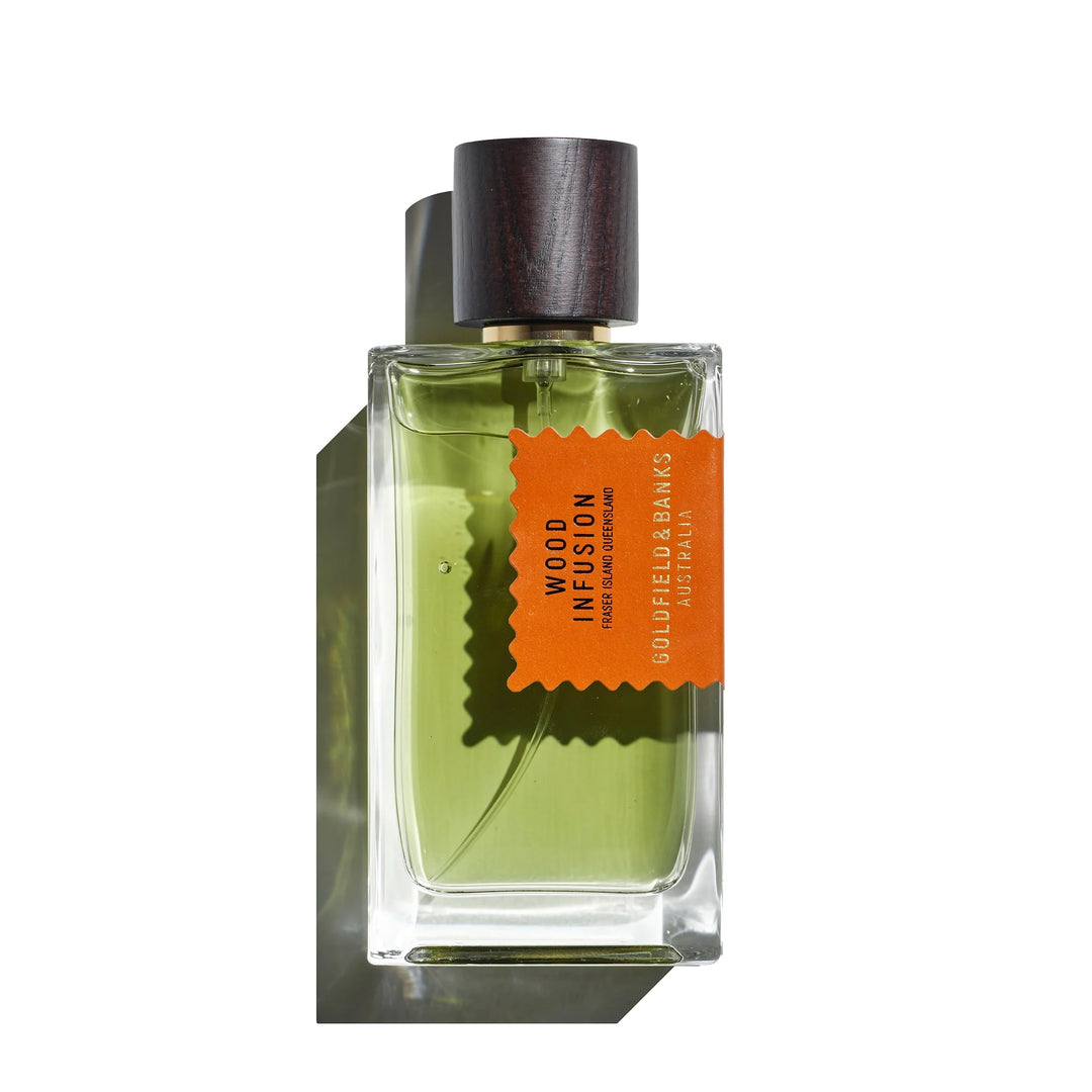 Goldfield & Banks Wood Infusion Eau de Parfum bottle with notes of sweet orange, lavender, iris, agarwood, and patchouli.