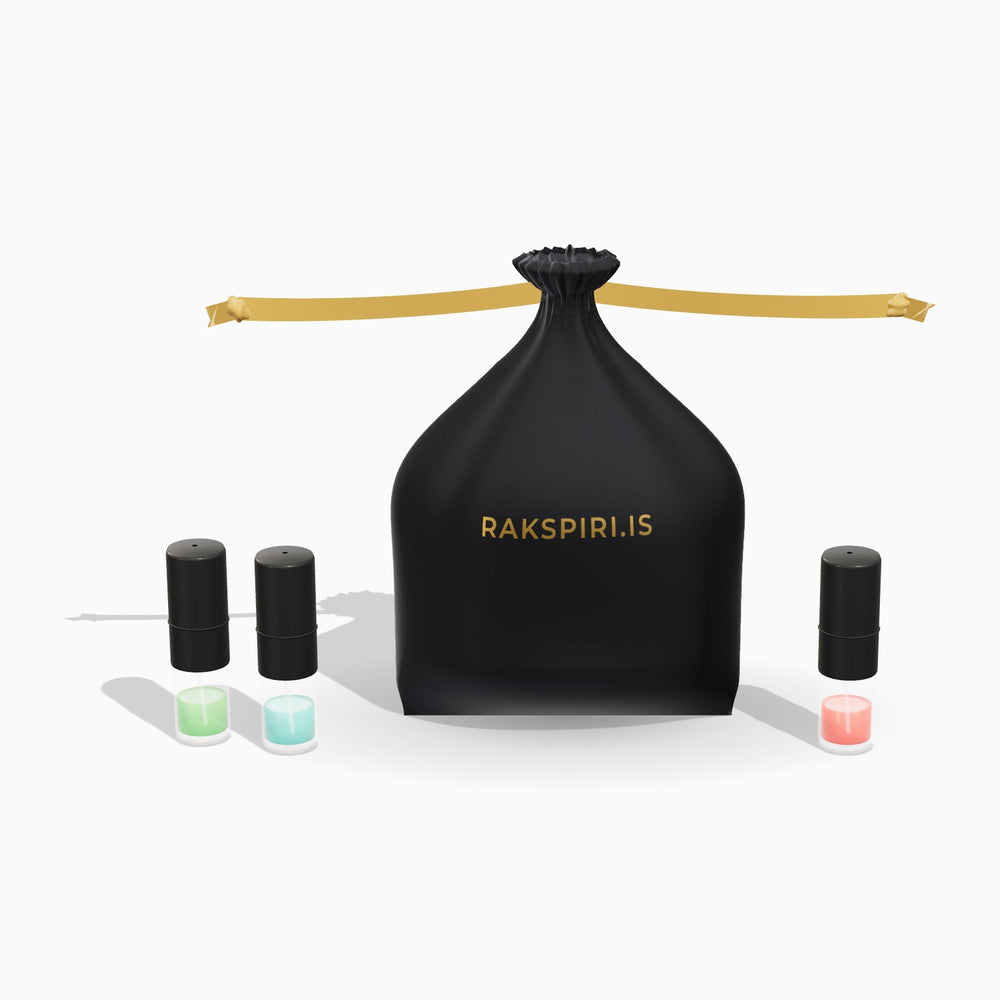Mystery Prufupoki – svartur satínpoki með gylltum borða og 1 ml prufum