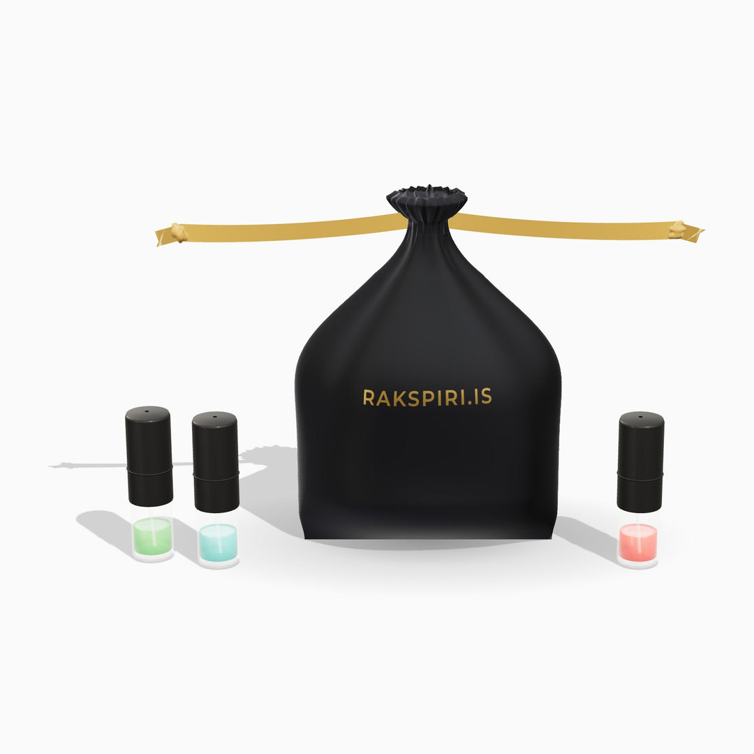 Mystery Prufupoki – svartur satínpoki með gylltum borða og 1 ml prufum